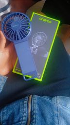 Oraimo Dual-Blade Foldable Fan: Portable Cooling with Power.
